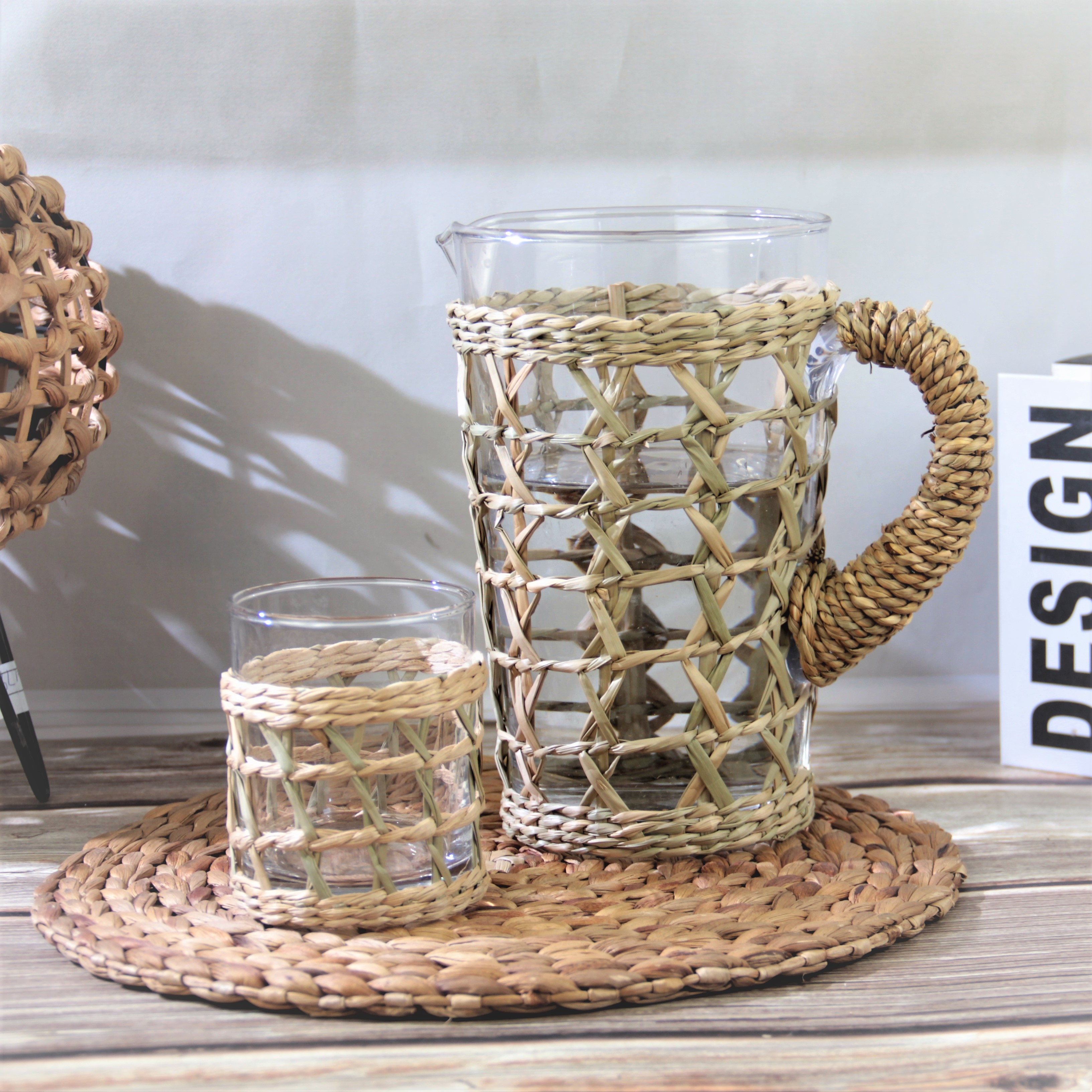 Bamboo woven glass pitcher